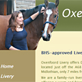 A screenshot of the Oxenfoord Livery Yard website.